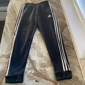 Adidas size large black/white strips on sides